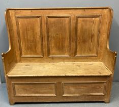 Victorian Welsh pine settle, the high back with three fielded panels, shaped sides with hinged box