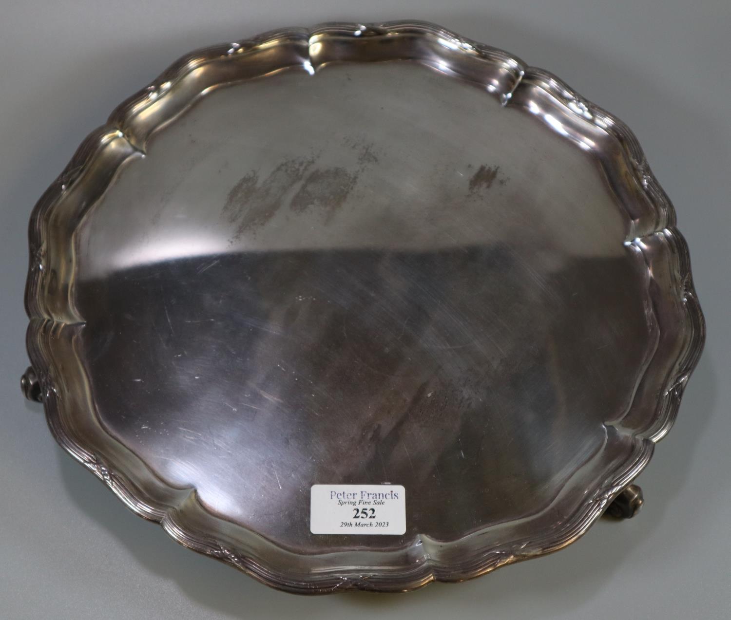 George V silver pie crust salver raised on three scroll feet, by 'Hawksworth, Eyre Co. Ltd.' - Image 2 of 3