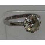 A 2ct diamond solitaire ring set in platinum. The old brilliant cut diamond an estimated diamond