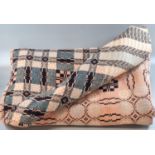 Vintage woollen Welsh tapestry blanket or carthen in peach, black and cream colours and geometric