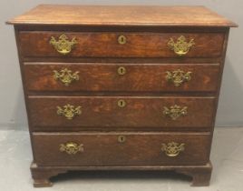 Late 18th/early 19th century oak straight front chest of drawers, the moulded top above a bank of