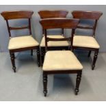 Set of four Regency mahogany dining chairs having stuff over seats standing on baluster turned