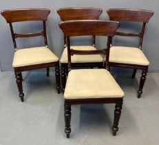 Set of four Regency mahogany dining chairs having stuff over seats standing on baluster turned