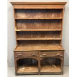 19th century scumbled pine two stage rack back pot board dresser, the moulded cornice above