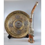 19th/20th century Indo Tibetan copper, brass and white metal circular tray with hammered and applied