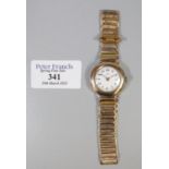 Early 20th century 9ct gold Omega ladies wristwatch with Arabic white face on gold plated bracelet