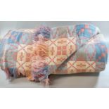Vintage pink, blue, cream and yellow woollen Welsh tapestry blanket with fringed edge and