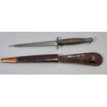 A Fairbairn Sykes third pattern late WWII period fighting knife with A3 MoD inspection mark, and