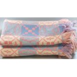 Vintage woollen Welsh tapestry blanket in pink, blue and cream colours, geometric design with