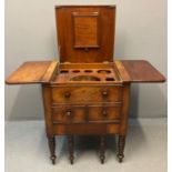 Early 19th century mahogany gentleman's wash stand, the moulded hinged top flanked by two drop