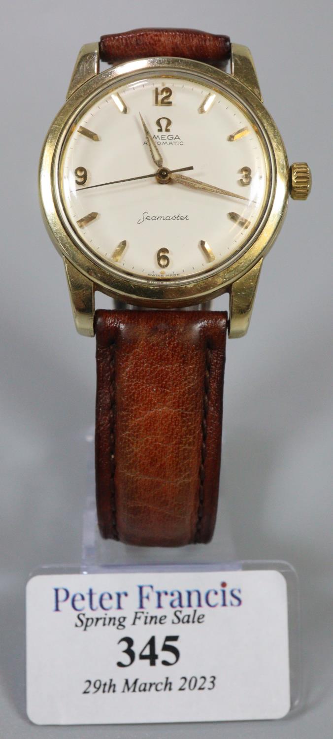 Omega Seamaster Automatic gold plated gents wristwatch with satin face and baton numerals.