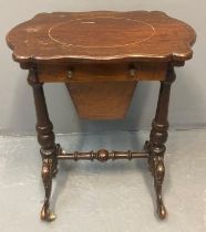Victorian mahogany work table, the shaped top above a single pullout deep drawer standing on