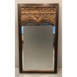 Thai design ornately carved mirror with fluted frame, the top area intricately carved with antique