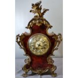 19th century French ormolu mounted walnut veneered balloon shaped eight day mantle clock, having