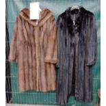 Two vintage fur coats; one is black ranch mink fur with silky lining and guarantee from Sovereign