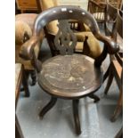 Early 20th century oak splat back swivel office/captain's chair on circular moulded seat. (B.P.