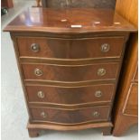 Reproduction mahogany serpentine design chest of four drawers on bracket feet. 52x41x72cm approx. (