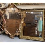 Modern ornately gilt framed mirror together with another modern gilt framed mirror with moulded