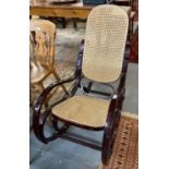 Modern stained bentwood and cane rocking armchair. (B.P. 21% + VAT)
