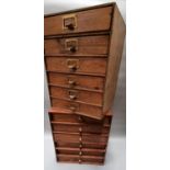 Early 20th century table top pine six drawer filing cabinet together with a six drawer filing