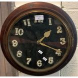 Late 19th early 20th century single train school type mahogany wall clock. the face with plastic/