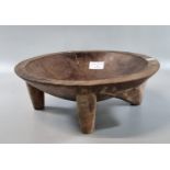 Fijian hardwood Kava Tanoa (bowl) on four tapered legs with triangular lug to one side. 31cm