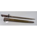 Remington WW I period US bayonet, dated 1913 with leather covered metal mounted scabbard. (B.P.