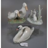 Royal Copenhagen 755 model of a swan together with a Royal Copenhagen 2128 model of two geese and
