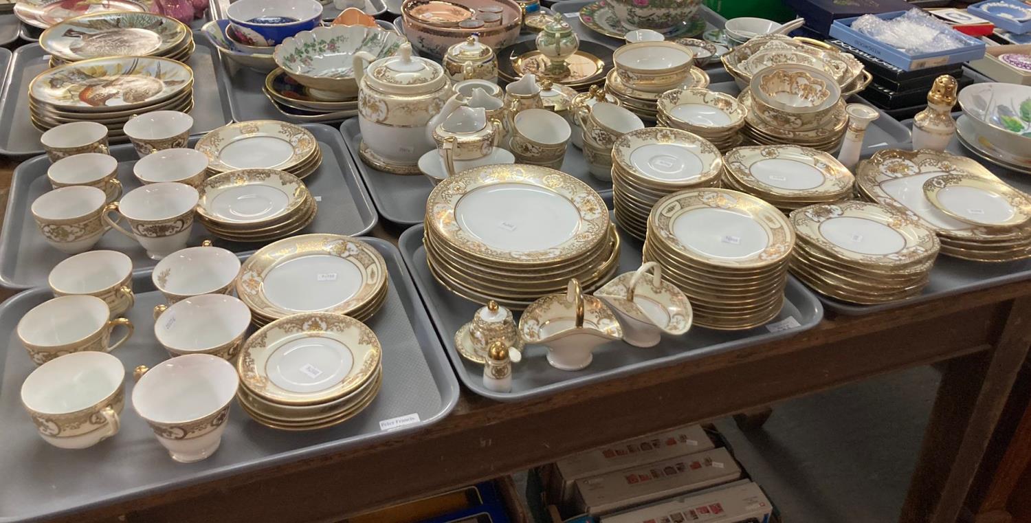 Six trays of Noritake porcelain Japanese tea and dinnerware items on a white ground with gilded