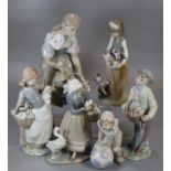 Collection of Lladro Spanish porcelain figurines, to include: girl with basket of flowers, girl with