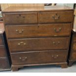 19th century oak straight front chest of two short and three long drawers on bracket feet. (B.P. 21%