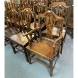 Harlequin set of 19th century oak camel back farmhouse chairs, to include one carver chair. (9) (B.