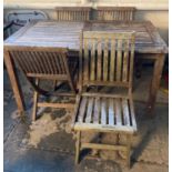 Teak garden table and four matching chairs in weathered condition. (5) (B.P. 21% + VAT)