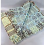 Traditional woollen Welsh tapestry blanket or carthen on bright blue ground with fringed edge. (B.P.