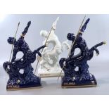 Three Remy Martin fine Champagne Cognac Centaure Limoges decanters (empty) two in blue and gold, the