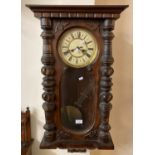 Early 20th century walnut two train enamelled faced Vienna type wall clock. (B.P. 21% + VAT)