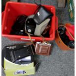Box of cameras and other optical equipment to include: Keenox digital video camera, Kodak Brownie