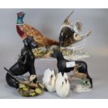 Collection of porcelain, china and composition animals, to include: Beswick pheasant, German Angel