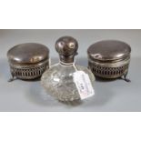 Pair of silver lidded dressing table jars and covers together with a silver topped and glass scent