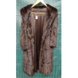 National Fur Company dark brown knee length vintage fur coat. (B.P. 21% + VAT)