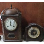 Oxidised metal two train lantern design mantle clock with Arabic face, together with a Bakelite