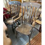 Two similar late 19th early 20th century stained slat back farmhouse kitchen armchairs. (2) (B.P.