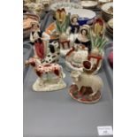 Collection of 19th century Staffordshire pottery Flatback figurines and animals, including: sheep