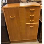 1960s pale oak G Plan small wardrobe with an arrangement of drawers. (B.P. 21% + VAT)