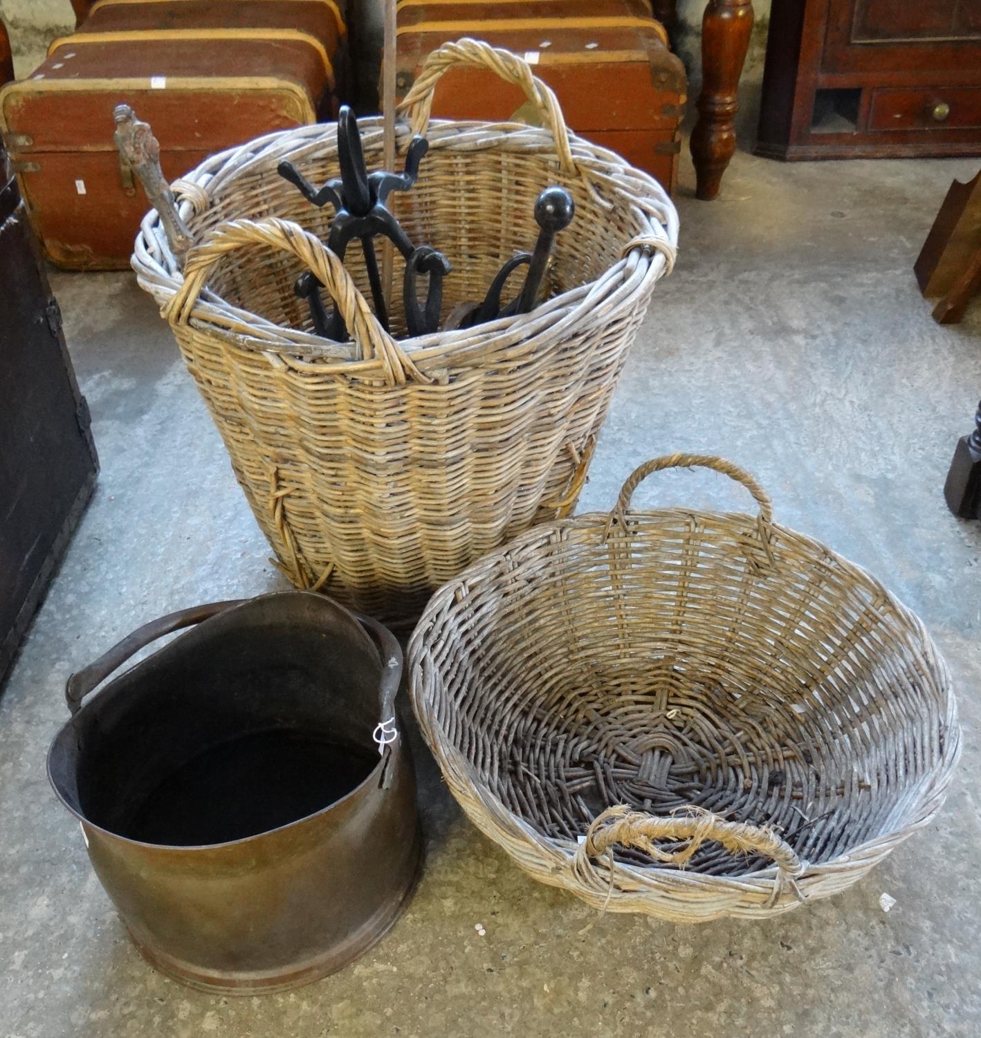 Collection of items, to include: helmet shaped coal scuttle, various fire irons, wicker log basket