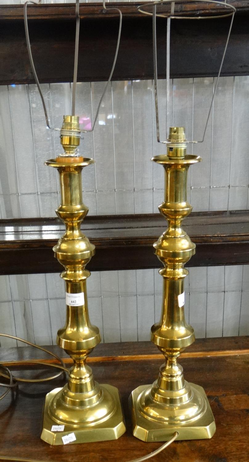 Pair of large baluster brass candlesticks now converted to lamp bases. 46cm high approx. (B.P. 21% +