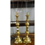 Pair of large baluster brass candlesticks now converted to lamp bases. 46cm high approx. (B.P. 21% +