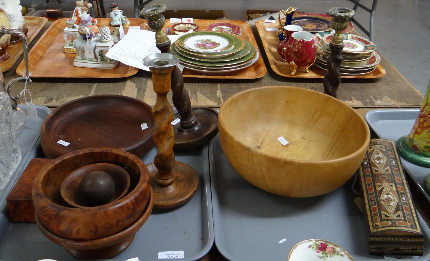 Two trays of assorted items: carved wooden bowls and candlesticks, intricately inlaid Syrian '