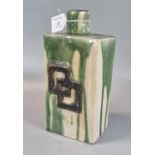 Unusual Art pottery drip glazed flask shaped vase with geometric raised design, unmarked. 24cm