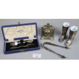 Bag of oddments, to include: cased set of two Rococo design pickle forks, pair of silver sugar nips,